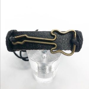Black leather bracelet.